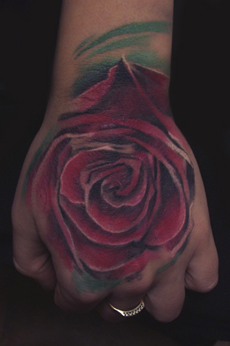 Looking for unique  Tattoos? Healed Rose on hand